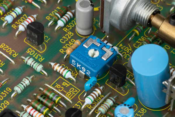 Trimmer pot on an oscilloscope circuit board (Outtake)